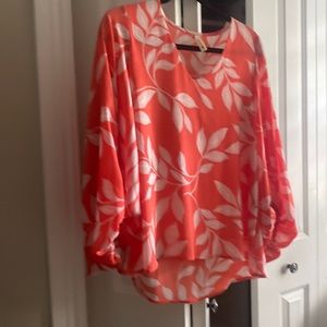 Orange and white floral print top